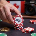 20-A-close-up-shot-of-a-dealers-hand-placing-a-stack.jpg